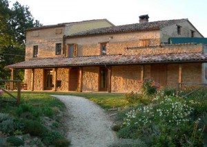 The same aspect of Casa Carotondo in 2013. The walls are faced with stone and a loggia added. 