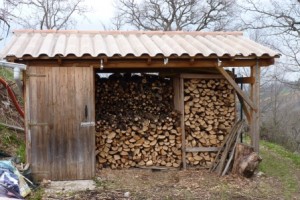 Our log store, nearly full and ready for next winter. 