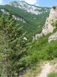 Walking towards the Eremo di Soffiano in the valley of the Terro river in the Sibillini Mountains, Le Marche, Italy